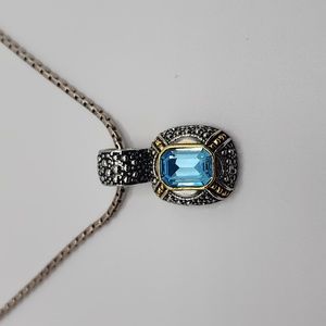 Costume Silver and gold tone Necklace with Blue Accent Gem.